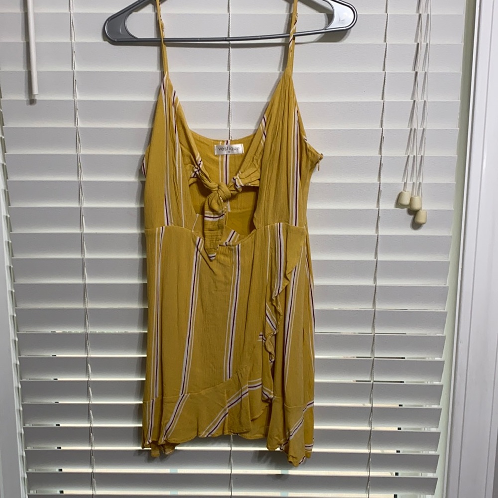 Vestique mini dress with open slit